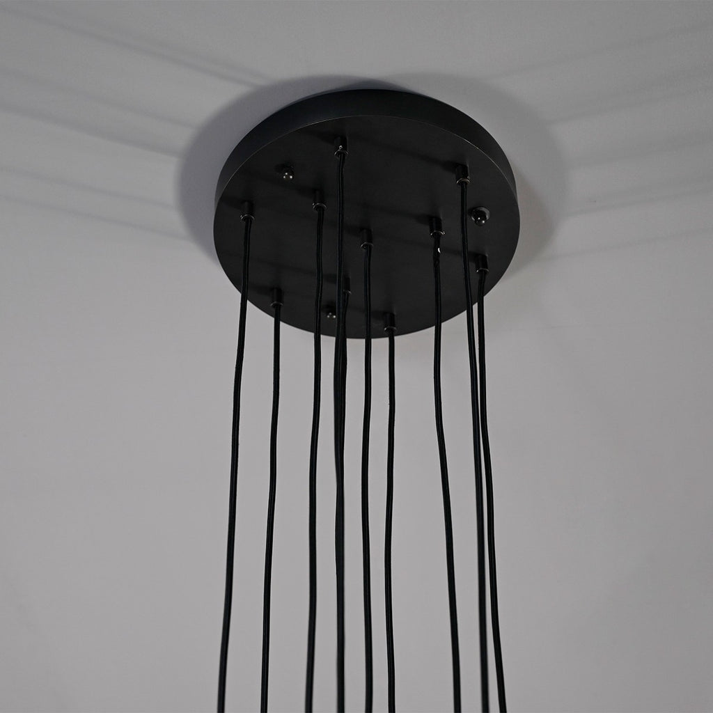 Modern dining room chandelier with clear crystal shades and black metal fixture