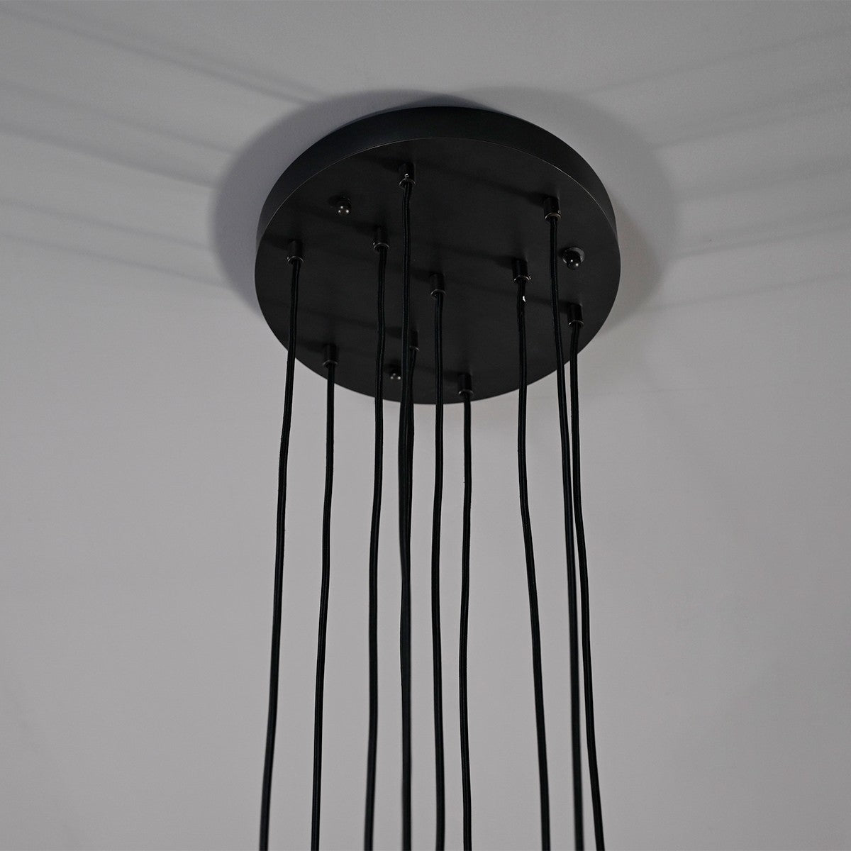 Modern dining room chandelier with clear crystal shades and black metal fixture