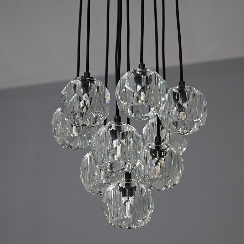 Modern dining room chandelier with clear crystal shades and black metal fixture