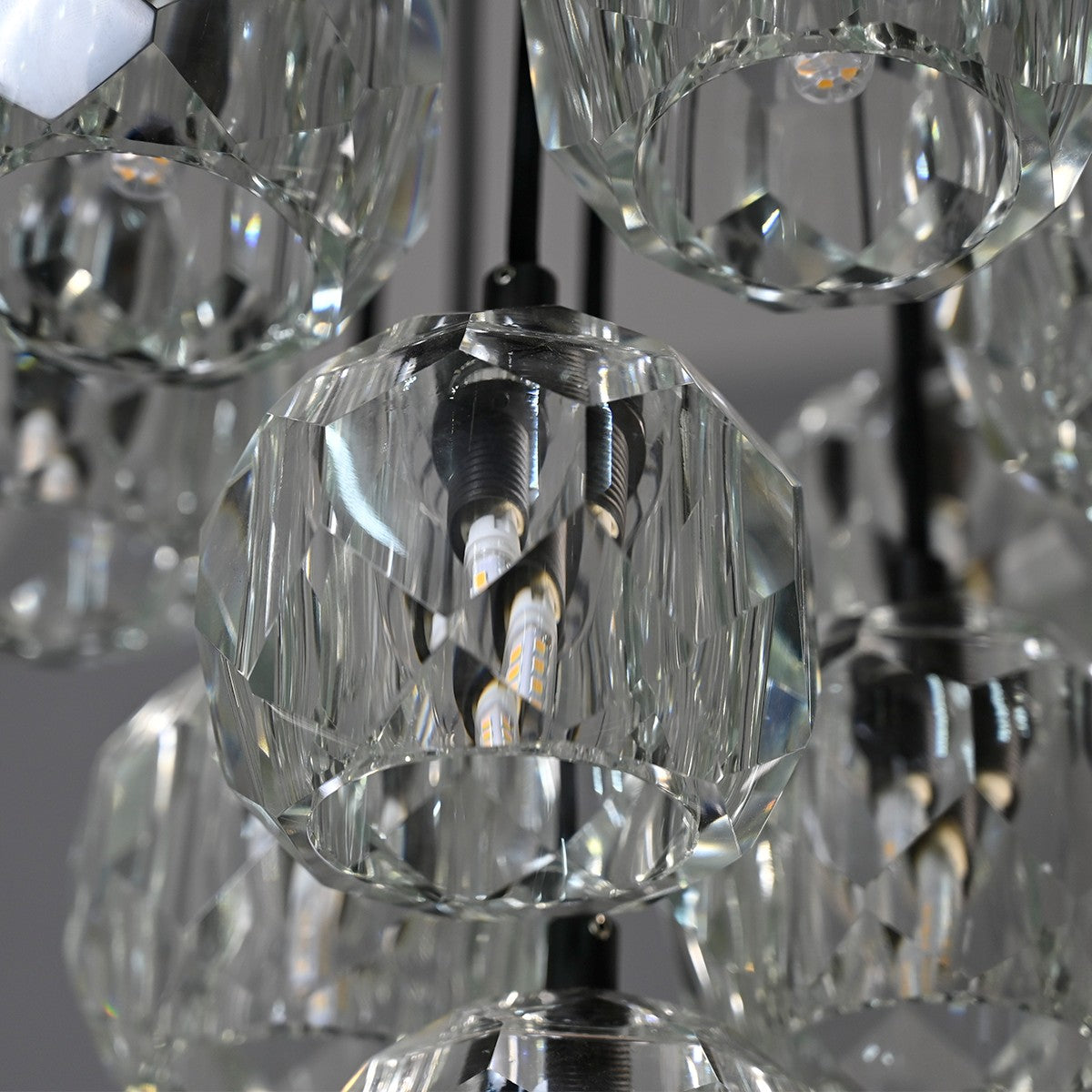 Modern dining room chandelier with clear crystal shades and black metal fixture