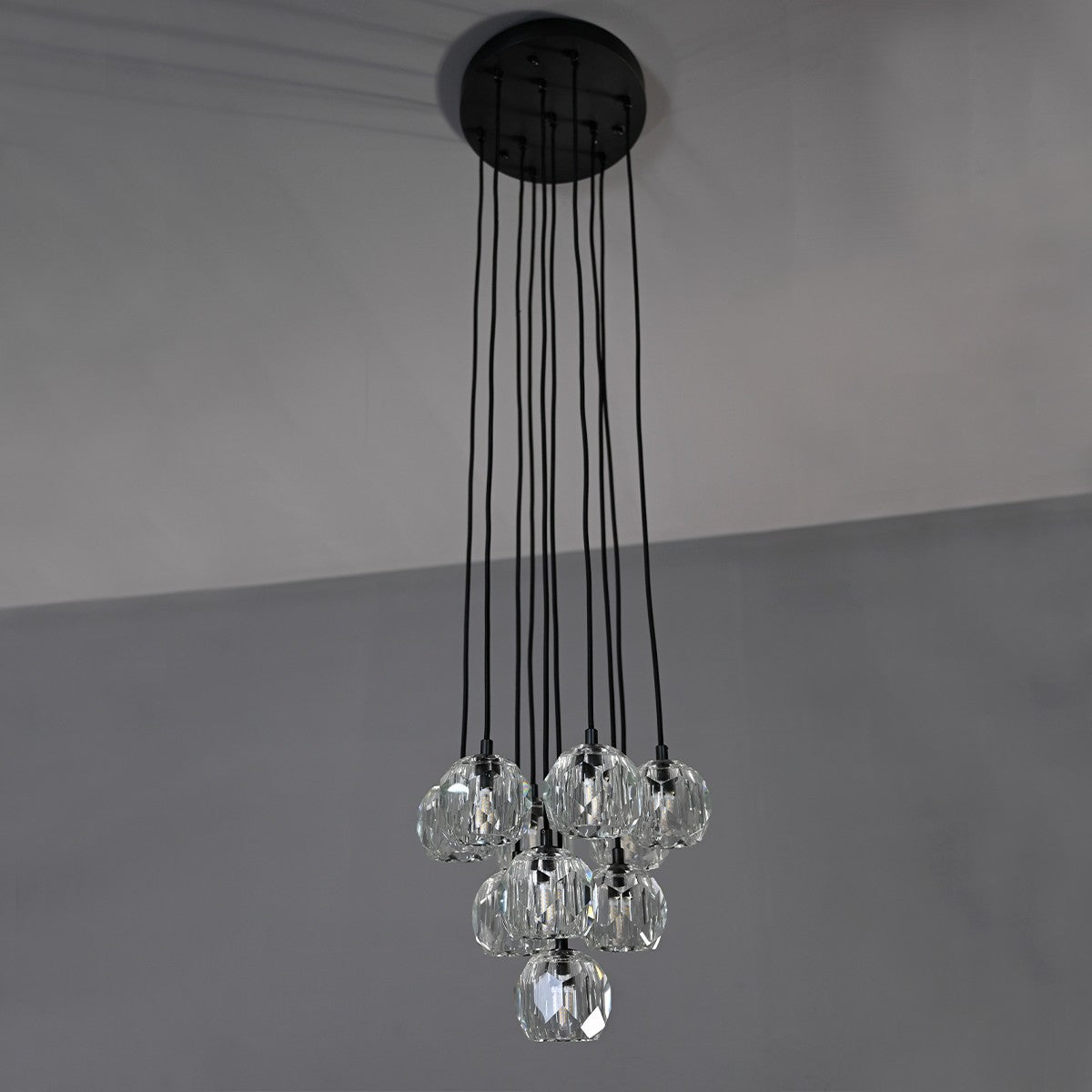Modern dining room chandelier with clear crystal shades and black metal fixture