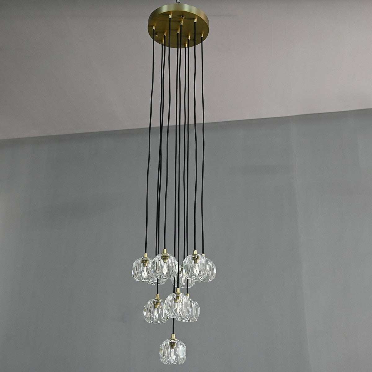 Modern dining room chandelier with clear crystal shades and black metal fixture