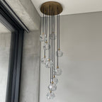 Modern dining room chandelier with clear crystal shades and black metal fixture