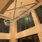 63 Inch Tubular Candle Tiered Chandelier - Camino