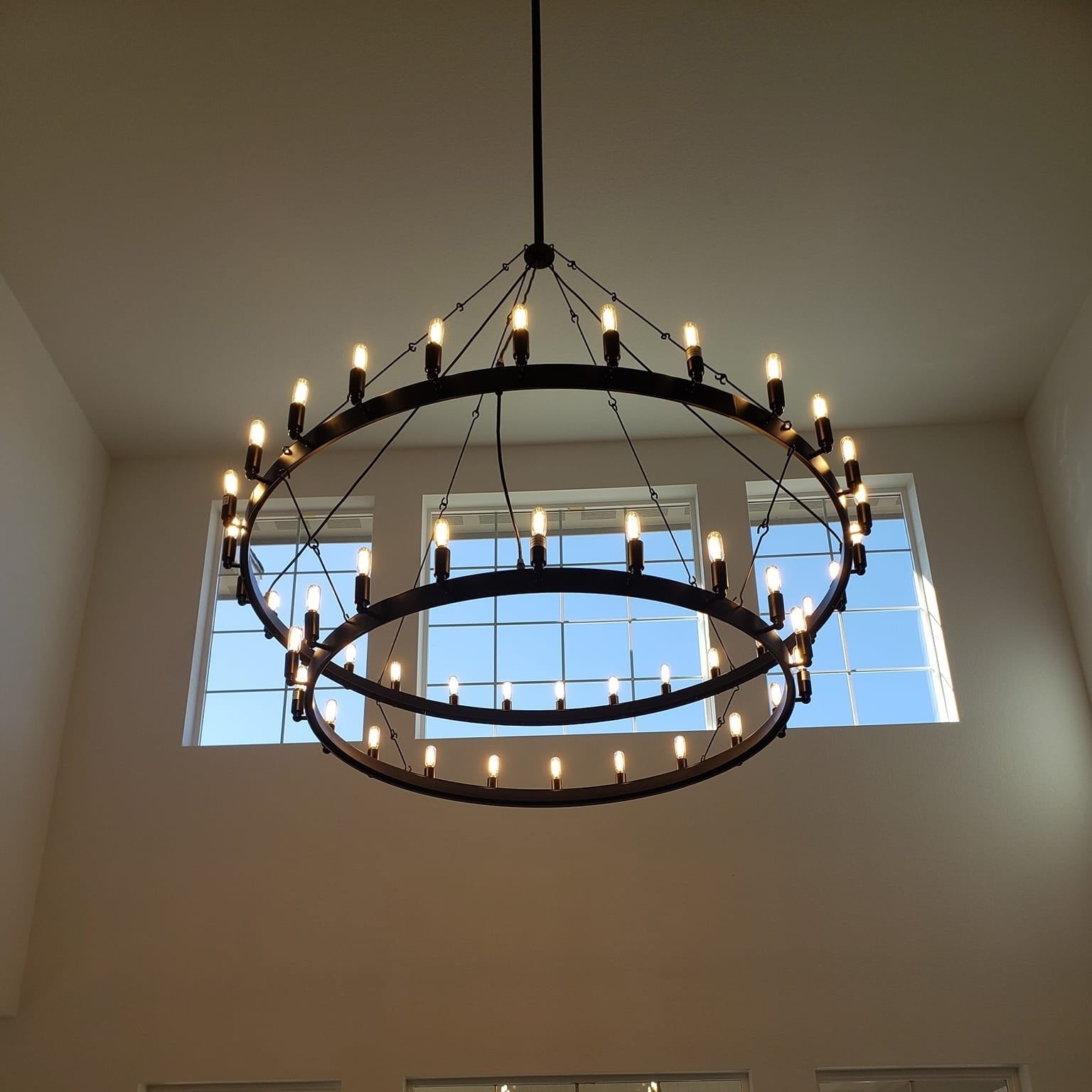 63 Inch Tubular Candle Tiered Chandelier - Camino
