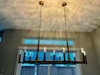 54 Inch Forged Candlestick Linear Chandelier - Thaddeus