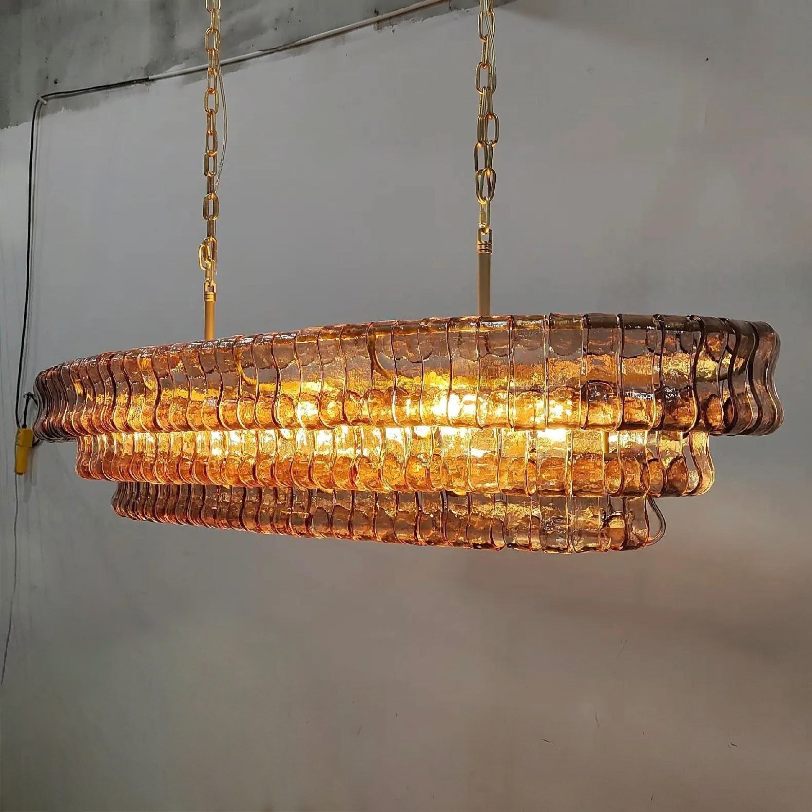 54 Inch Amber Glass Tiered Oval Chandelier - Ghiaccio