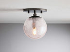 5 Inch Seeded Glass Globe Wall Sconce - Mandoza